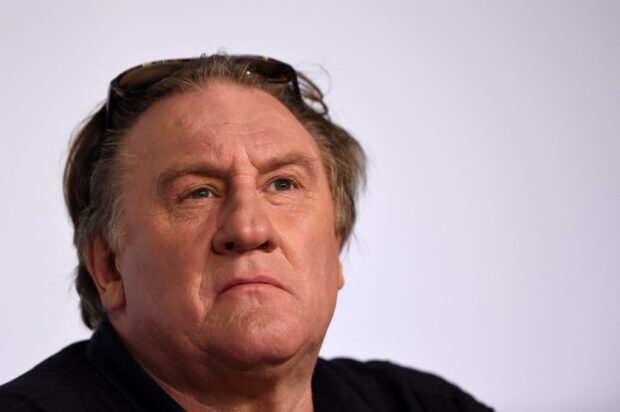 (FILES) In this file photo taken on May 22, 2015 French actor Gerard Depardieu attends a press conference for the film "Valley of Love" at the 68th Cannes Film Festival in Cannes, southeastern France. - Thirteen women accuse Gerard Depardieu, already under investigation for suspicions of rape and sexual assault on the actress Charlotte Arnould, of sexual violence, according to a report by Mediapart. Contacted by AFP, the Paris prosecutor's office said on April 12, 2023 that it "has not yet received any new complaint", and specified that the investigation opened in July 2020 following the complaint of an actress, Charlotte Arnould, was continuing. (Photo by Anne-Christine POUJOULAT / AFP)