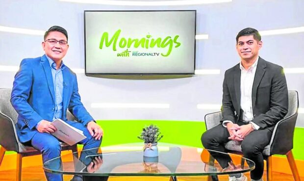 GMA Ilocos Norte anchor CJ Torida (left) and sportscaster/host Martin Javier