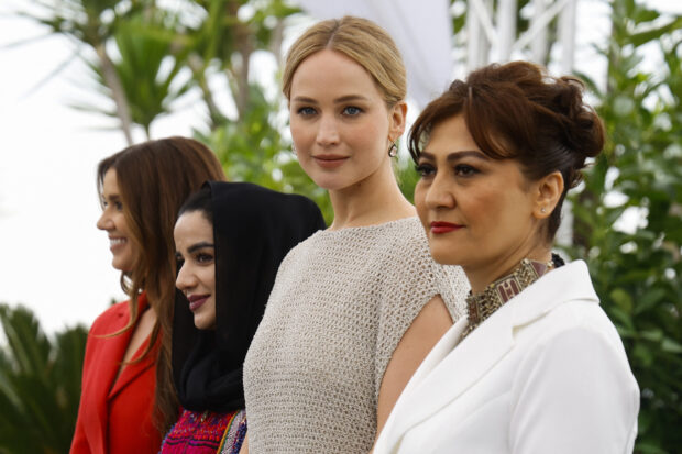 The 76th Cannes Film Festival - Photocall for the documentary film "Bread and Roses" presented as part of Special Screenings - Cannes, France, May 21, 2023. Director Sahra Mani and producers Jennifer Lawrence and Justine Ciarrocchi and a guest pose. REUTERS/Sarah Meyssonnier