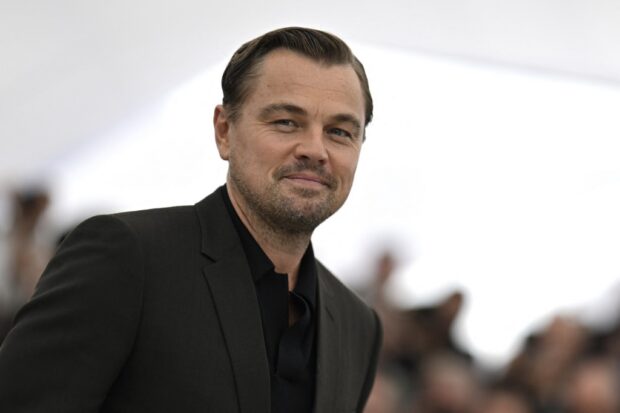 US actor Leonardo DiCaprio poses during a photocall for the film "Killers of the Flower Moon" at the 76th edition of the Cannes Film Festival in Cannes, southern France, on May 21, 2023. (Photo by Patricia DE MELO MOREIRA / AFP)