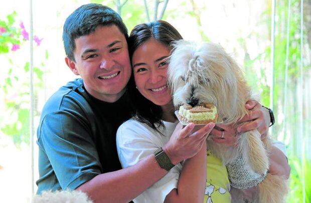 Guidicelli (left) and Sarah Geronimo with their dogs