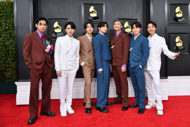 South Korean boy band BTS arrives for the 64th Annual Grammy Awards at the MGM Grand Garden Arena in Las Vegas on April 3, 2022. (Photo by ANGELA WEISS / AFP)