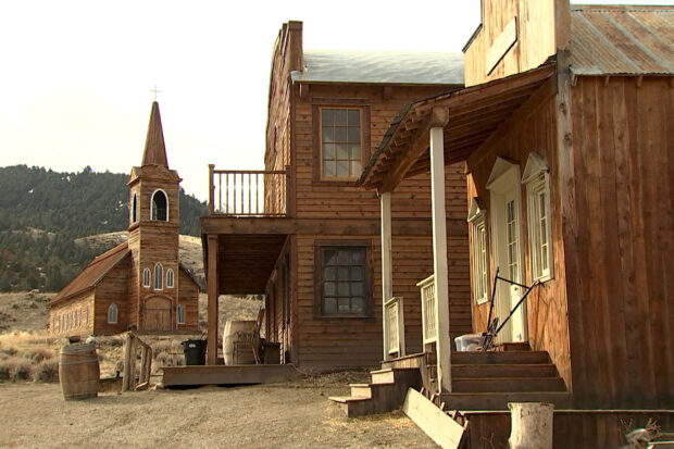 FILE PHOTO: Buildings used on the set of the movie "Rust" are seen near a chapel which will not be used, on the first day that filming resumed after the 2021 shooting death in New Mexico of cinematographer Halyna Hutchins, in Livingston, Montana, U.S. April 21, 2023 in a still image from video. REUTERS/Sandra Stojanovic/File Photo