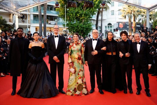 FILE PHOTO: Mamoudou Athie, Leah Lewis, Pete Docter, Denise Ream, Director Peter Sohn, Adele Exarchopoulos, Vincent Lacoste and Jim Morris pose on the red carpet to attend the closing ceremony and the screening of the animated film "Elemental" Out of competition, during the 76th Cannes Film Festival in Cannes, France, May 27, 2023. REUTERS/Sarah Meyssonnier/File Photo