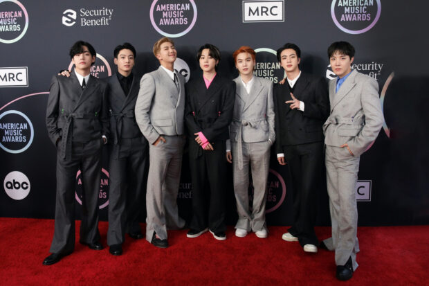 BTS members pose on the red carpet for the American Music Awards 2021. (Big Hit Music)