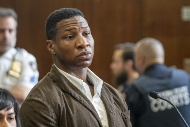 Jonathan Majors is seen in court during a hearing in his domestic violence case, Tuesday, June 20, 2023 in New York.  Majors’ domestic violence case will go to trial Aug. 3, the judge said Tuesday, casting him in a real-life courtroom drama as his idled Hollywood career hangs in the balance. (AP Photo/Steven Hirsch, Pool)