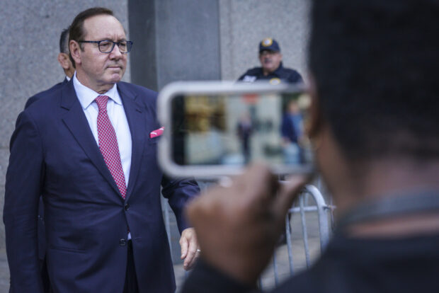 FILE - Actor Kevin Spacey leaves a court in New York, Tuesday, Oct. 11, 2022. Double Academy Award-winner Kevin Spacey goes on trial in London this week, accused of sexual offenses against four men in Britain. Spacey, 63, faces a dozen charges, which he denies. His trial starts Wednesday at Southwark Crown Court. (AP Photo/Bebeto Matthews, File)