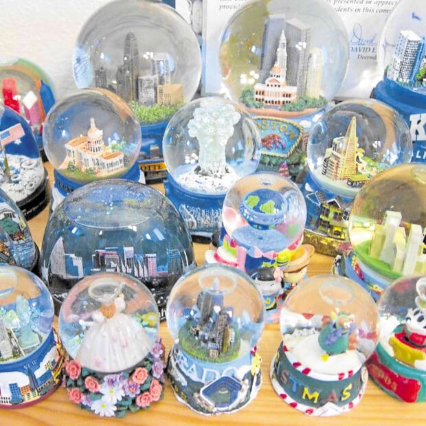A collection of snow globes —PINTEREST
