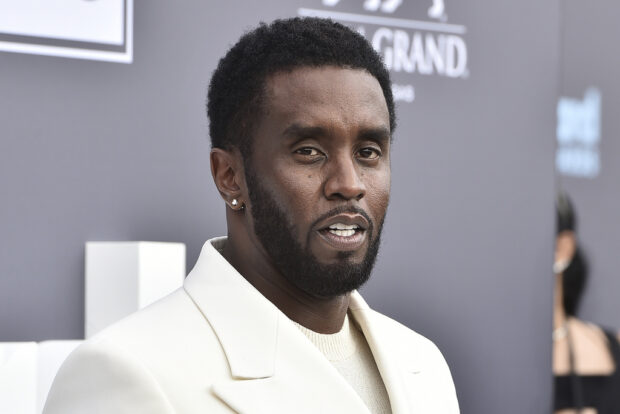 FILE - Music mogul and entrepreneur Sean "Diddy" Combs arrives at the Billboard Music Awards in Las Vegas on May 15, 2022.  Spirits giant Diageo says it’s cutting ties with Combs following his move to sue the company over allegations of racism in the handling of his liquor brands, according to a Tuesday, June 27, 2023 court filing.  (Photo by Jordan Strauss/Invision/AP, File)