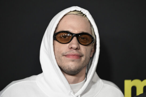 FILE - Pete Davidson attends the premiere of "Meet Cute" in New York on Sept. 20, 2022. Davidson has entered a diversion program to resolve a reckless driving charge for crashing into a Beverly Hills home, and will perform 50 hours community service, authorities said Tuesday. The 29-year-old “actor and comedian will likely do his community service with the New York Fire Department, where his late father worked, Los Angeles County prosecutors said. (Photo by Evan Agostini/Invision/AP, File)