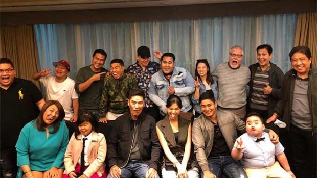 Arjo Atayde (second row, fifth from left) and Maine Mendoza (first row, third from right) first met at the story conference for the 2018 Metro Manila Film Festival (MMFF) entry “Jack Em Popoy: The Puliscredibles.” Image: FILE PHOTO