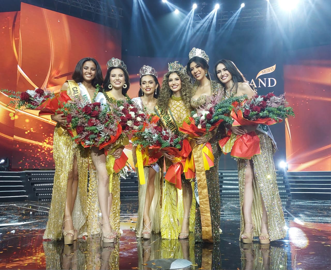 Miss Grand Philippines Nikki De Moura (third from right) is flanked by (from left) second runner-up Charie Manalo Sergio, Miss Eco Teen Philippines Francine Reyes, Reina Hispanoamericana Filipinas Michelle Arceo, Miss Philippines Tourism Herlene Budol, and first runner-up Shanon Tampon.