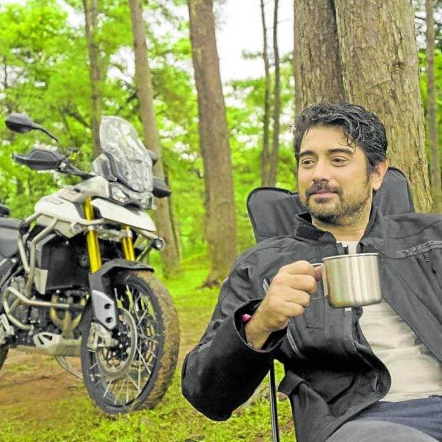 Ian Veneracion enjoys his coffee after a motorcyle ride