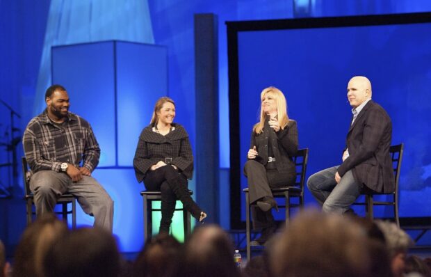 FILE - Michael Oher, left, Collins Tuohy, second from left, and Leigh Anne Tuohy, whose lives are portrayed in the Oscar-nominated movie "The Blind Side," speak with Pastor Kerry Shook, right, March 3, 2010 at Woodlands Church's Fellowship Campus in The Woodlands, TX. Michael Oher, the former NFL tackle known for the movie “The Blind Side,” filed a petition Monday, Aug. 14, 2023, in a Tennessee probate court accusing Sean and Leigh Anne Tuohy of lying to him by having him sign papers making them his conservators rather than his adoptive parents nearly two decades ago. (AP Photo/The Courier, Eric S. Swist, File)