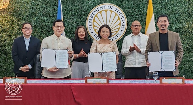 The memorandum of agreement was signed by Tourism Secretary Christina Frasco (center), Tirso FDCP Chair and CEO Tirso Cruz III (left), and TIEZA COO Mark Lapid (right). The witnesses were (from left) FDCP executive director Dan Morales, Tourism Undersecretary Mae Elain Bathan, and TIEZA Assistant COO Jetro Lozada.