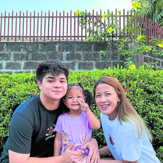 Bugoy Cariño (left) and fiancee EJ Laure with daughter, Scarlet --CONTRIBUTED