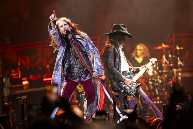 Steven Tyler, left, and Joe Perry of Aerosmith perform during night one of their "Peace Out: The Farewell Tour" on Saturday, Sept. 2, 2023, at Wells Fargo Center in Philadelphia. (Photo by Amy Harris/Invision/AP)