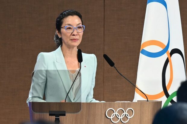 Malaysian actress Michelle Yeoh takes the oath as member of the International Olympic Committee (IOC) during the third day of the 141st IOC session in Mumbai on October 17, 2023. Yeoh was voted onto the International Olympic Committee on October 17. The first Asian woman to win an Academy Award -- when she scooped best actress for "Everything Everywhere All at Once" earlier this year -- was elected by 67 votes to nine, with one abstention. (Photo by INDRANIL MUKHERJEE / AFP)