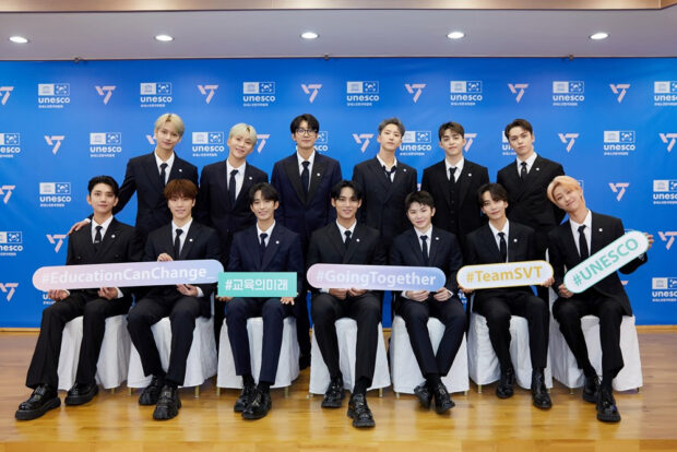 A picture provided by Pledis Entertainment shows Seventeen members posing after they sign a business partnership for the "#GoingTogether" campaign with the Korea National Council for UNESCO in August 2022. Image: Pledis Entertainment via The Korea Herald