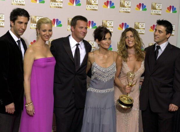 FILE - David Schwimmer, Lisa Kudrow, Matthew Perry, Courteney Cox, Jennifer Aniston and Matt LeBlanc pose after "Friends" won outstanding comedy series at the 54th Primetime Emmy Awards Sept. 22, 2002, in Los Angeles. Perry, who starred as Chandler Bing has died. The actor was found dead of an apparent drowning at his Los Angeles home on Saturday, according to the Los Angeles Times and celebrity website TMZ, which was the first to report the news. Both outlets cited unnamed sources confirming Perry’s death. His publicists and other representatives did not immediately return messages seeking comment. (AP Photo/Reed Saxon, File)