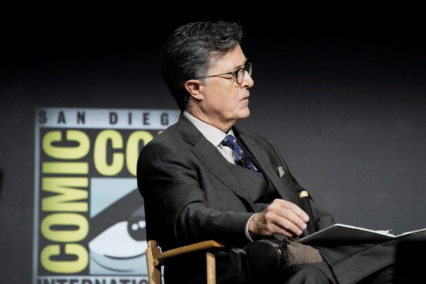 FILE PHOTO: Stephen Colbert moderates a panel on the Prime Video streaming series The Lord of the Rings: The Rings of Power at Comic-Con International in San Diego, California, U.S., July 22, 2022. REUTERS/Bing Guan/File Photo