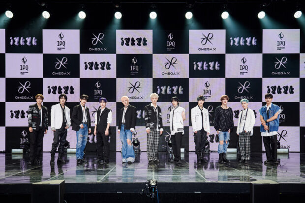 Members of Omega X pose for picture during a press conference for the band's third EP, "iykyk," in Seoul, Tuesday. Image: IPQ via The Korea Herald