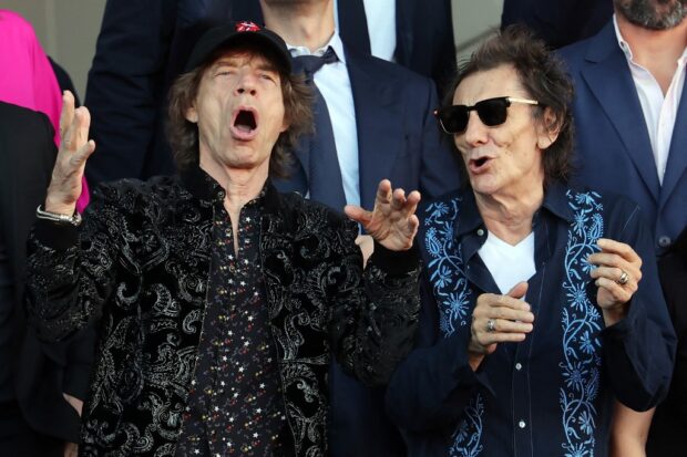 Members of the English rock band The Rolling Stones, Mick Jagger (left) and Ronnie Wood 