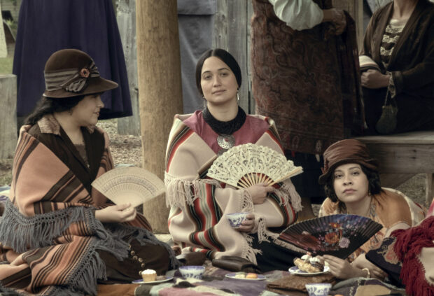 (From left) JaNae Collins, Lily Gladstone, and Cara Jade Myers in a scene from "Killers of the Flower Moon"