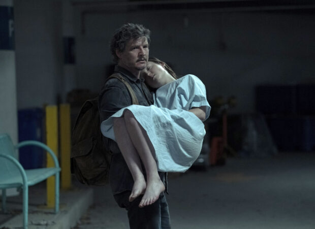 Pedro Pascal, left, and Bella Ramsey in a scene from the series "The Last of Us."