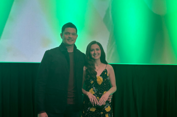 Dingdong Dantes very proud of wife Marian Rivera, co-stars in ‘Rewind’Dingdong Dantes and Marian Rivera during the advanced screening of "Rewind." Image: X/@StarCinema