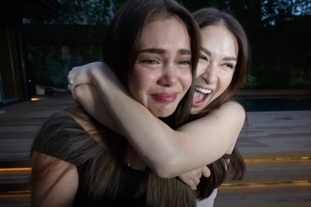 Ivana Alawi (left) was hugged by Marian Rivera (right) after a prank. Image: Screengrab from YouTube/Ivana Alawi