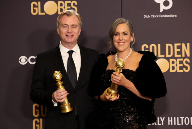 Period film "Oppenheimer" leads a list of winners at the 2024 Golden Globe awards on Sunday with five major awards.Christopher Nolan and Emma Thomas pose with the awards for Best Director and Best Motion Picture - Drama at the 81st Annual Golden Globe Awards in Beverly Hills, California, U.S., January 7, 2024. REUTERS/Mario Anzuoni