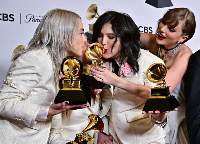 Taylor Swift (right) winner of Best Pop Vocal Album and Album of the Year for "Midnights" poses with Julien Baker, Phoebe Bridgers, Lucy Dacus of indie group boygenius holding the Grammy Awards for Best Alternative Music Album for "The Record", Best Rock Song for "Not Strong Enough" and Best Rock Performance for "Not Strong Enough" during the 66th Annual Grammy Awards at the Crypto.com Arena in Los Angeles on Feb. 4. Image: Frederic J. Brown / AFP