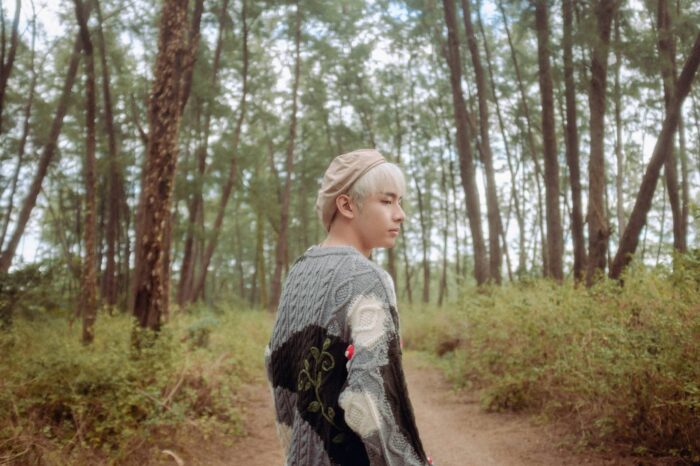 SB19's Justin in a concept photo for "Surreal." Image: Courtesy of Sony Music Philippines and 1Z Entertainment
