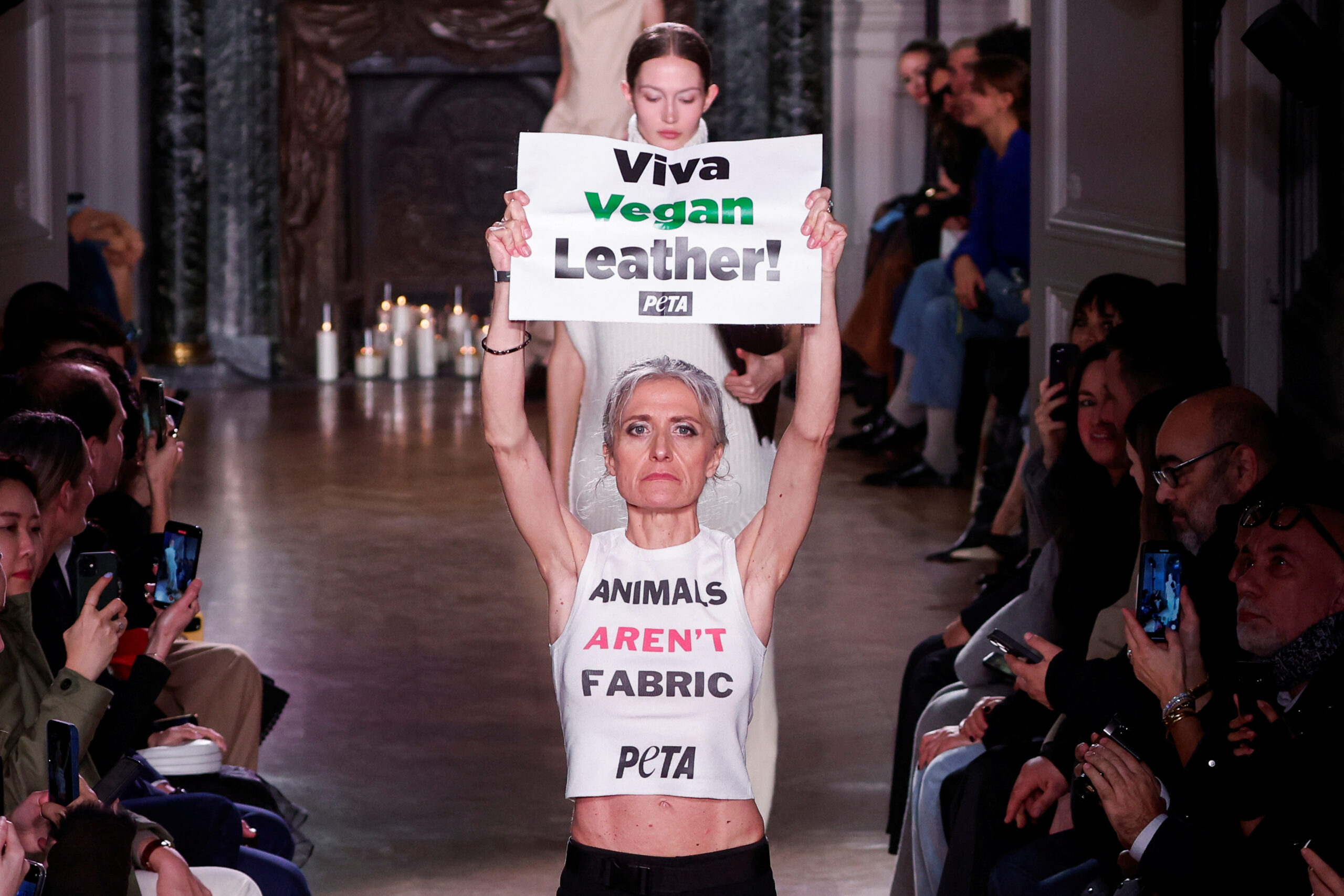 Animal rights activists disrupt Victoria Beckham show in Paris