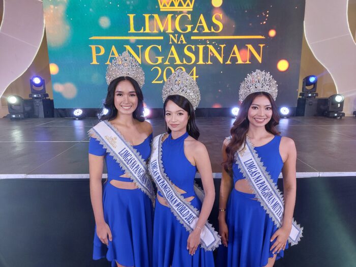 Reigning Limgas na Pangasinan queens (from left) Rona Lalaine Lopez, Nikhisah Buenafe Cheveh, and Stacey De Ocampo on Gwnedolyne Fourniol. Image: Armin P. Adina/INQUIRER.net