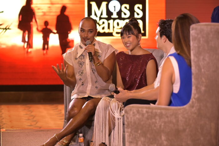 Abigail Adriano (center) with "Miss Saigon" castmates Seann Miley Moore (leftmost) and Nigel Huckle (second from right) in a media call. Image: Courtesy of GMG Productions