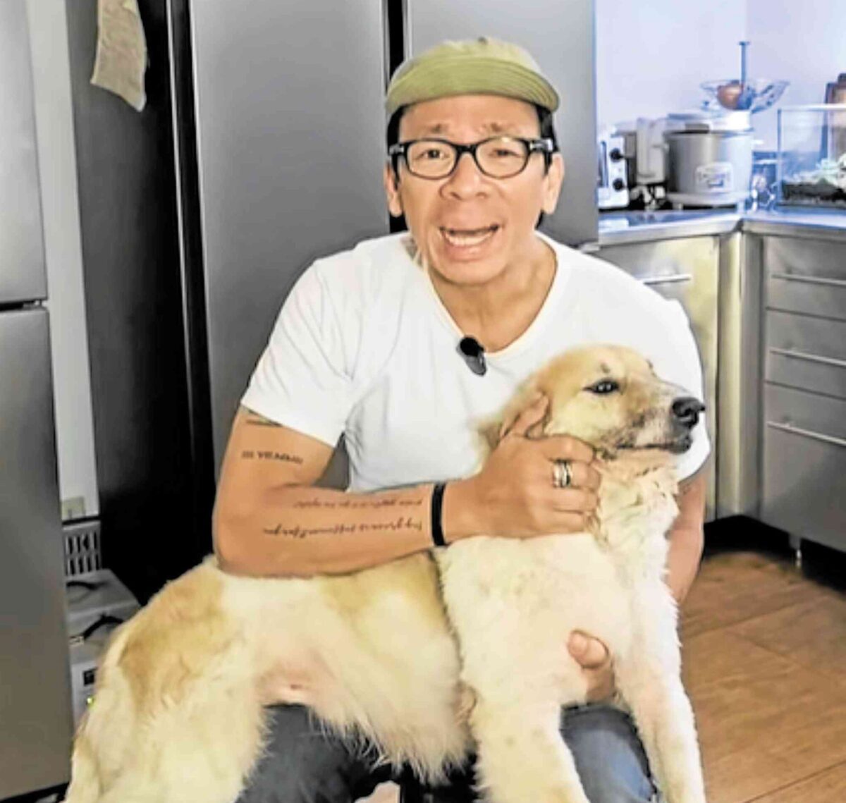 Atienza with adopted dog Lolo Raf