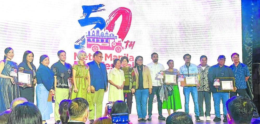 Representatives of the first five Metro Manila Film Festival (MMFF) entries, with MMFF organizers and Manila Mayor Honey Lacuna-Pangan (fifth from left) and first lady Liza Araneta-Marcos (seventh from left)