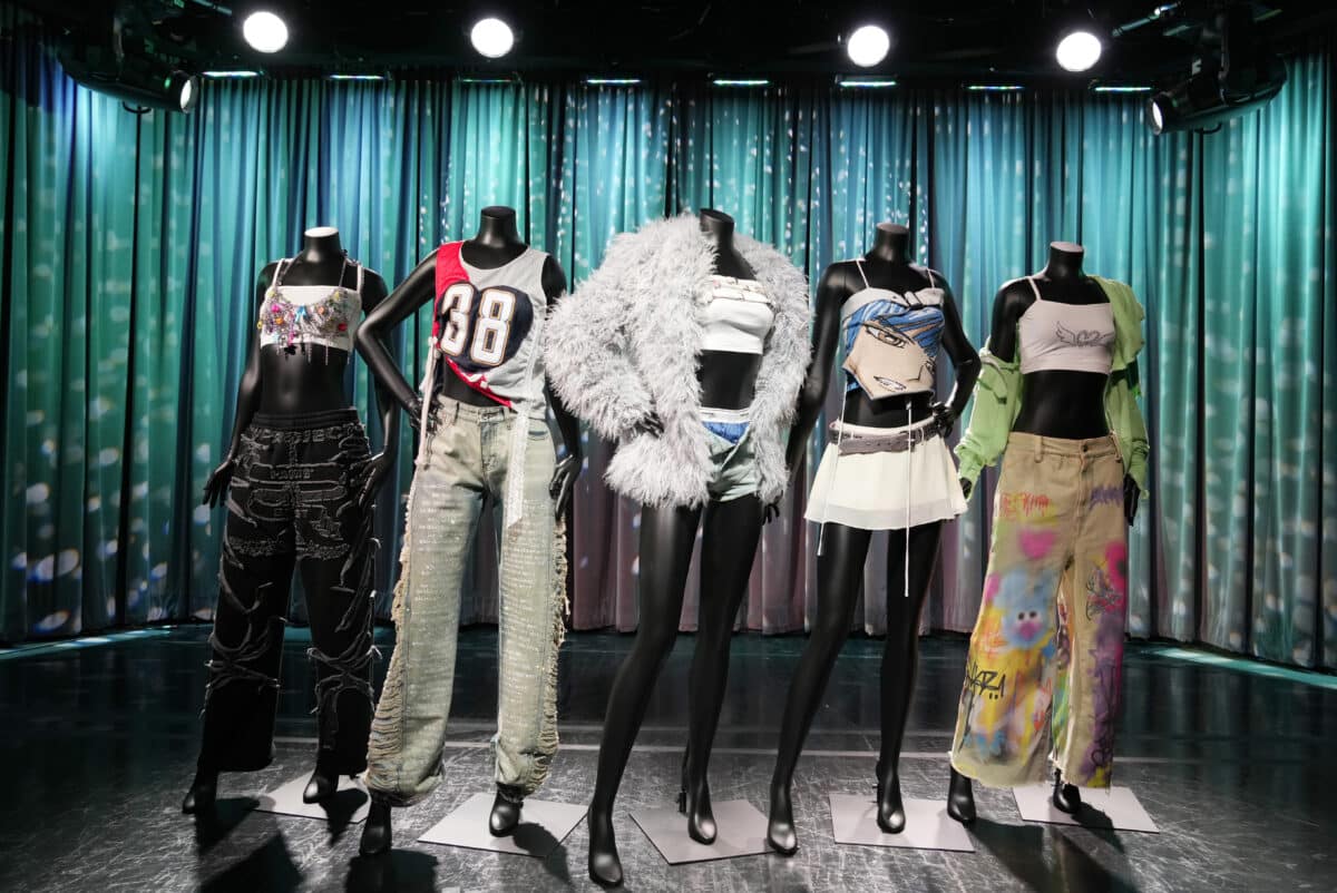 Outfits worn by the Korean pop group LE SSERAFIM in their "Easy" music video are previewed at the K-pop HYBE Exhibit at the Grammy Museum, Friday, June 28, 2024, in Los Angeles. Image: AP/Chris Pizzello
