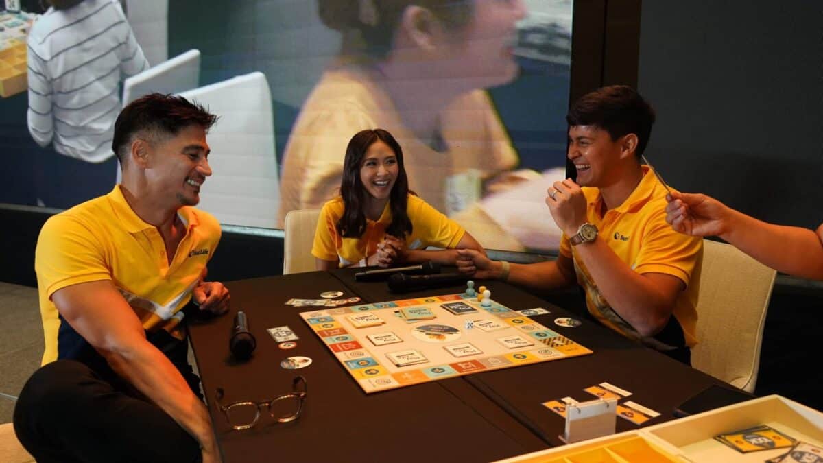 Sarah Geronimo (center) with Piolo Pascual and her husband Matteo Guidicelli at an insurance event. Image: Handout photo