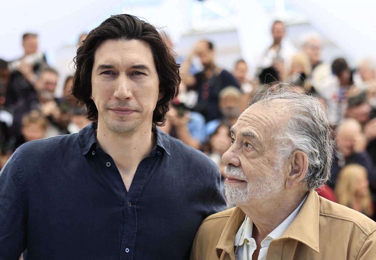 New Coppola film trailer axed for using fake movie reviews. US actor Adam Driver (L) and US director Francis Ford Coppola pose during a photocall for the film "Megalopolis" at the 77th edition of the Cannes Film Festival in Cannes, southern France, on May 17, 2024. (Photo by Valery HACHE / AFP)