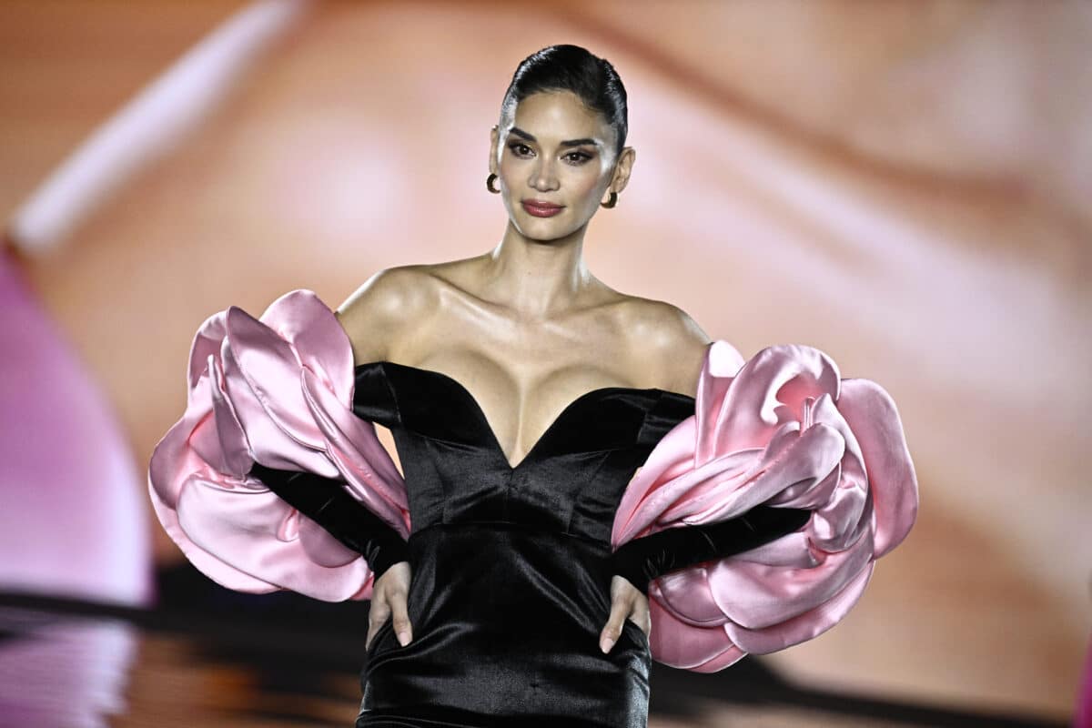 Filipino model, actress, and Miss Universe 2015 Pia Wurtzbach presents a creation for L'Oreal Paris show "Walk Your Worth" as part of the Paris Fashion Week Women Ready-to-wear Spring-Summer 2025 collection at Palais Garnier opera house, in Paris on Sept. 23, 2024. Image: Julien De Rosa/AFP