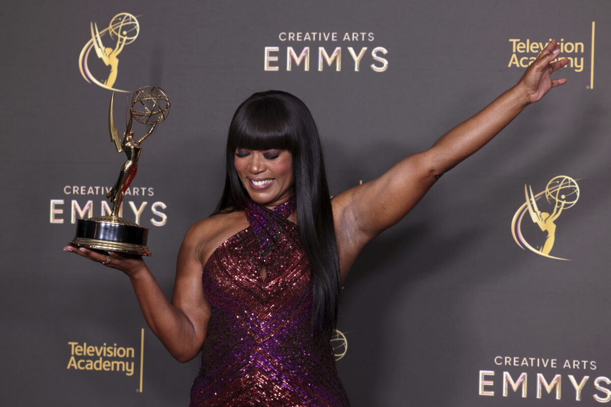 Angela Bassett poses with her Emmy for outstanding narrator for "Queens" in the press room during night one of the Television Academy's 76th Creative Arts Emmy Awards at the Peacock Theater on Saturday, Sept. 7, 2024 in Los Angeles. Image: Mark Von Holden/Invision for the Television Academy/AP Content Services