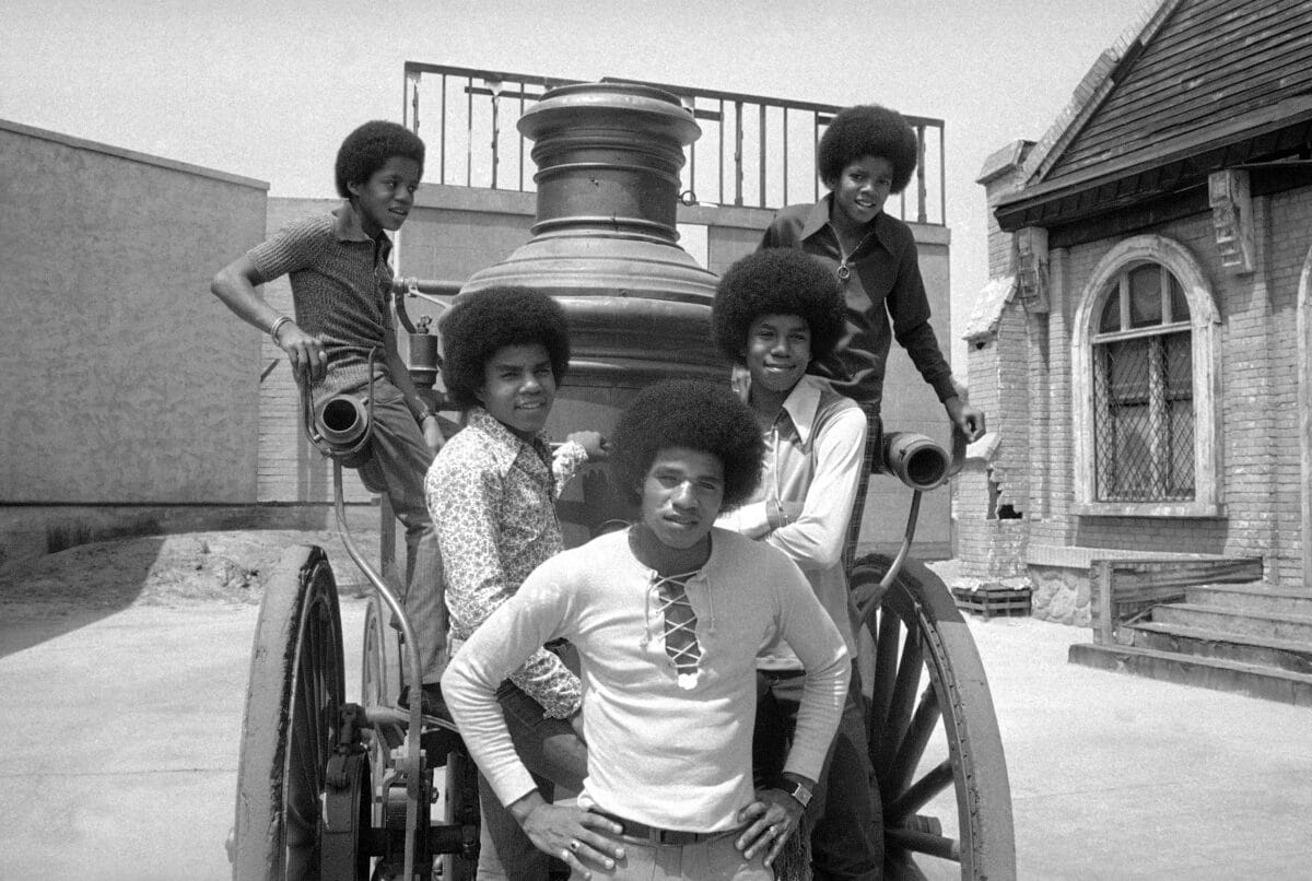 The five Jackson brothers who sing as the Jackson Five, are about ready to resume school after a summer vacation on Aug. 31, 1971, that took them to 40 cities in 60 days, playing concerts that attracted as many as 160,000. At top are Marlon, 14; left, and Michael, 12. Below are, left to right: Jackie 20; Tito 17, and Jermaine, 16. Image: AP Photo/David Smith