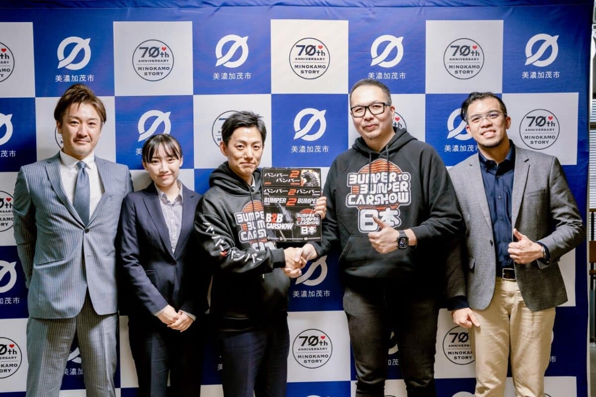 B2B Car Show Founder Jonathan Chio alongside Liberty Walk CEO and President Kato Wataru, and General Manager Toshiro Nishio, forging partnerships at the global automotive event.