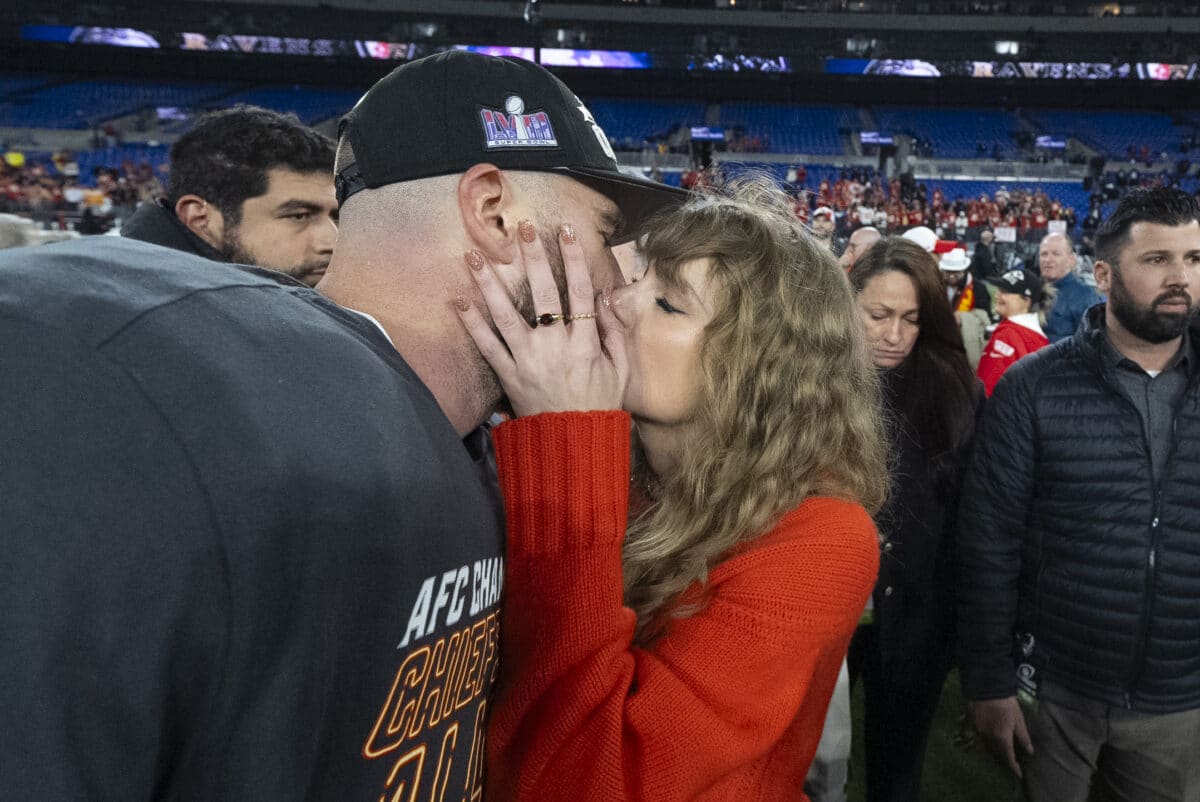 Kansas City Chiefs tight end Travis Kelce and Taylor Swift kiss after an AFC Championship NFL football game between the Kansas City Chiefs and the Baltimore Ravens, Sunday, Jan. 28, 2024, in Baltimore. The Kansas City Chiefs won 17-10. Image: AP/Julio Cortez