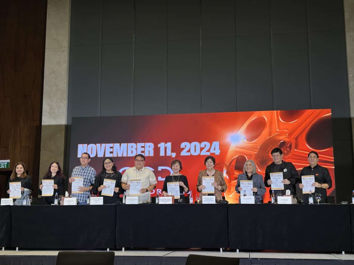 Mowelfund executives Boots Anson-Rodrigo (fourth from right), Gina Alajar (third from right), and executives from the Metro Manila Film Festival during a contract signing at a luxury hotel in Parañaque. Image: Hannah Mallorca/INQUIRER.net