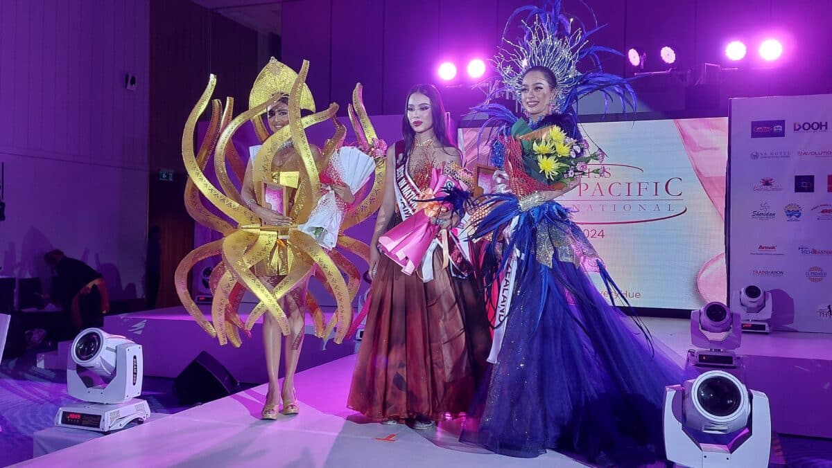 Best in National Costume Anh Vuong Pham Thi from Vietnam (center) with India's Sophiya Singh (left) and New Zealand's Katharina Weischede/ARMIN P. ADINA