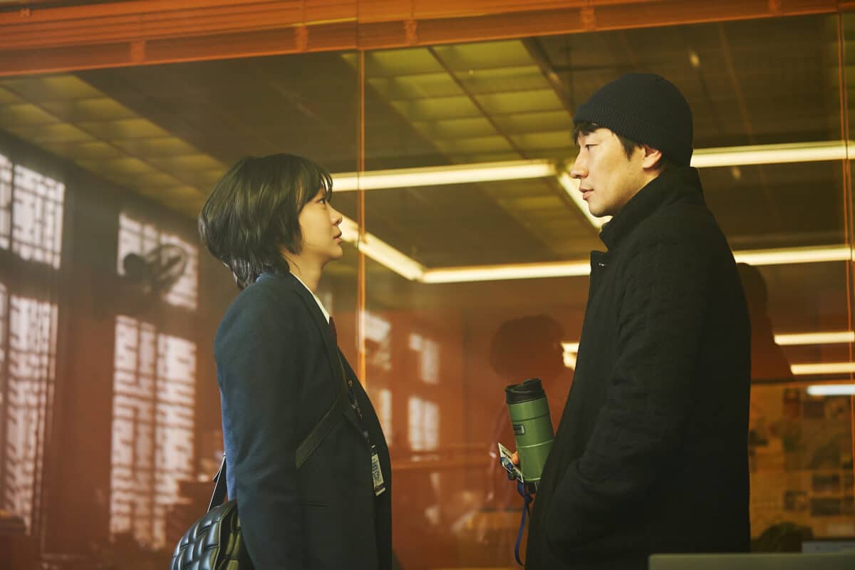 Kim Da-mi (left) and Son Suk-ku in a scene from "Nine Puzzles." Image: Courtesy of Disney+ Korea